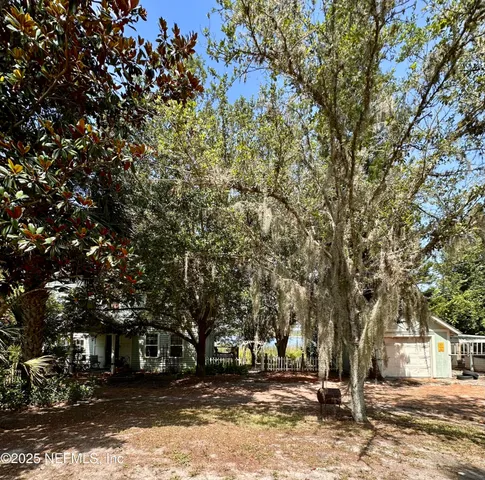 a view of road with trees