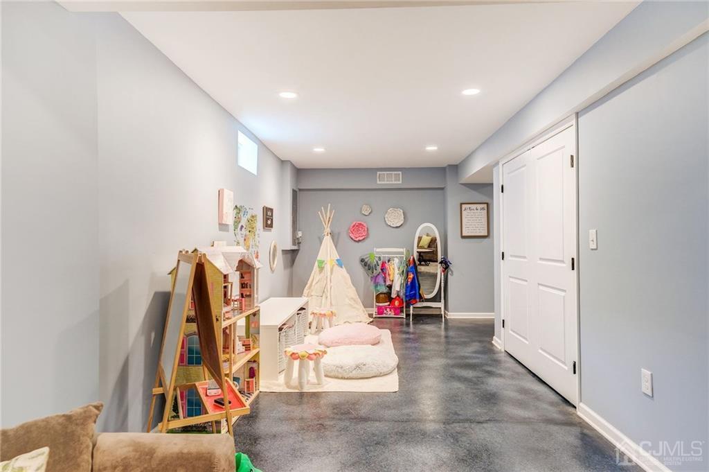 341 Dunellen Avenue Dunellen, NJ 08812 - Photo 22 of 24 a view of a room with gym equipment