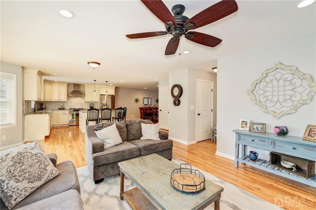 341 Dunellen Avenue Dunellen, NJ 08812 - Photo 10 of 24 a living room with furniture and a wooden floor