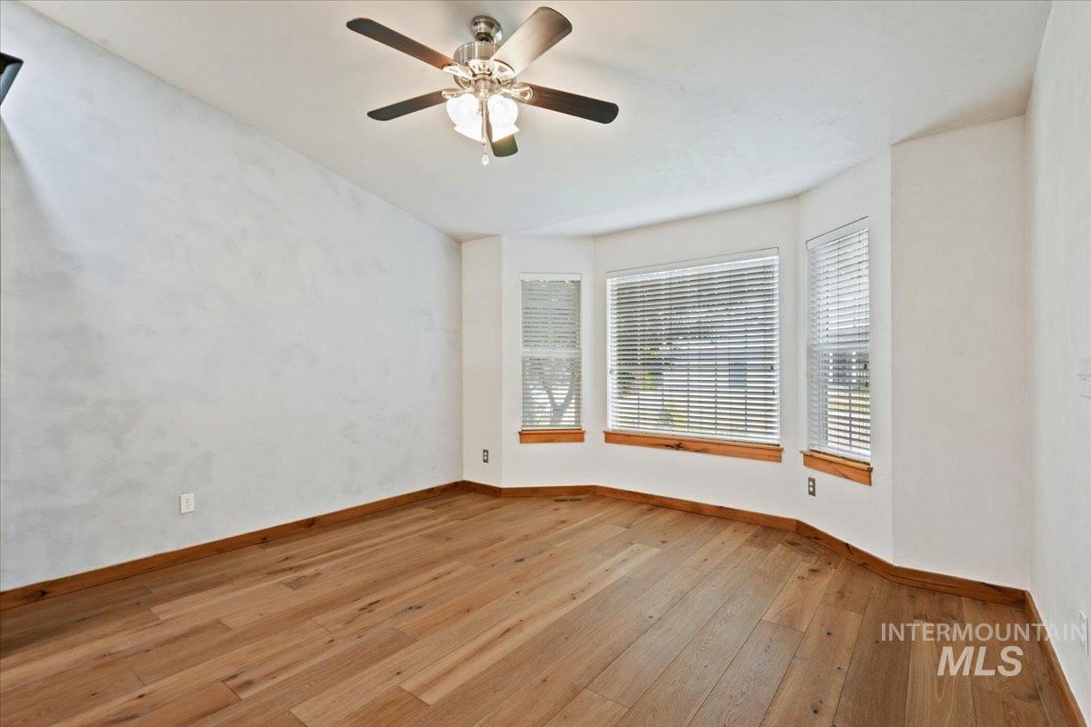 12019 West Rader Drive Boise, ID 83713 - Photo 13 of 41 This space alongside the kitchen is perfect for a sitting area, extra dining space or flex space