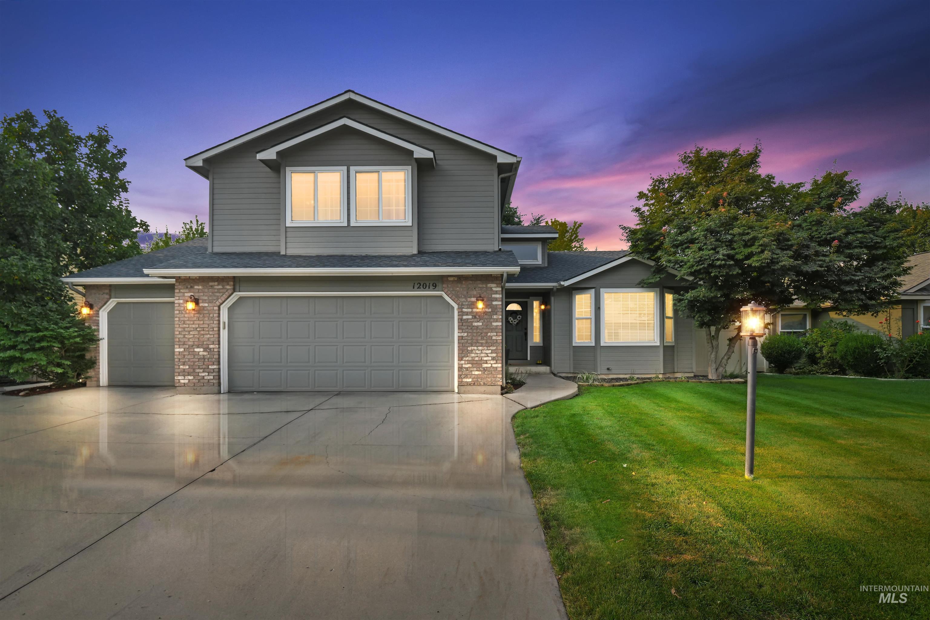 12019 West Rader Drive Boise, ID 83713 - Photo 3 of 41 Traditional-style home featuring a 3 car garage