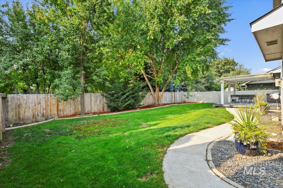12019 West Rader Drive Boise, ID 83713 - Photo 31 of 41 Fenced backyard featuring a patio area