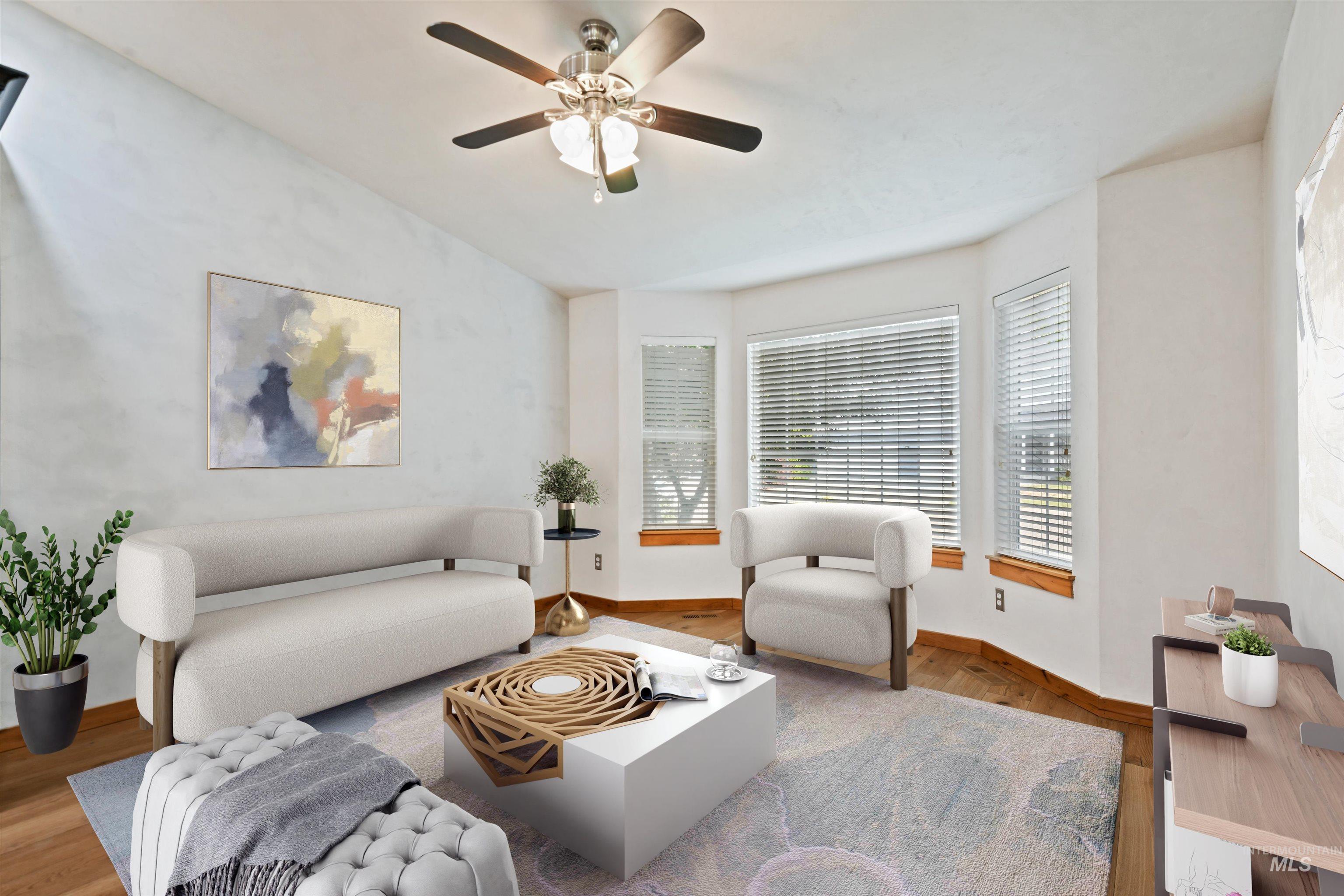 12019 West Rader Drive Boise, ID 83713 - Photo 4 of 41 This space alongside the kitchen is perfect for a sitting area, extra dining space or flex space