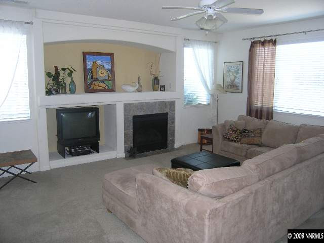 1895 Jamboree Drive Reno, NV 89521 - Photo 3 of 5 a living room with furniture and a fireplace