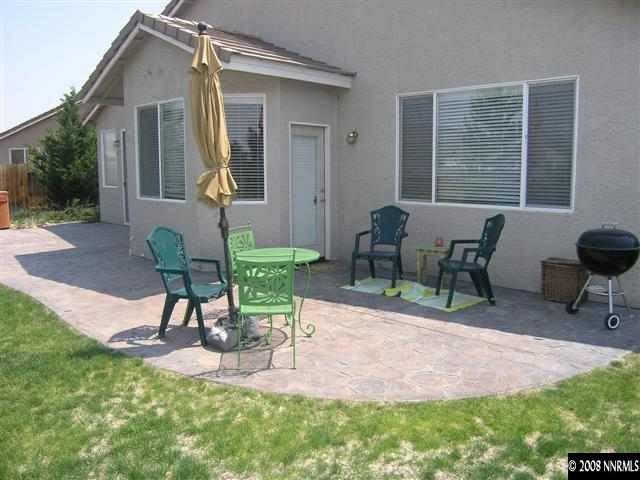 1895 Jamboree Drive Reno, NV 89521 - Photo 5 of 5 a view of a house with backyard and a sitting area