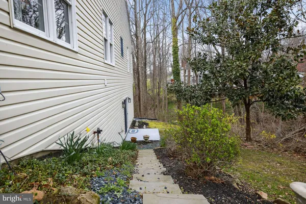 a view of a pathway with a yard