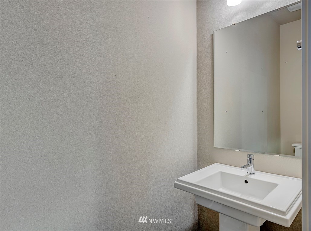 4204 223rd Place Southeast Bothell, WA 98021 - Photo 11 of 23 a bathroom with a sink and a mirror