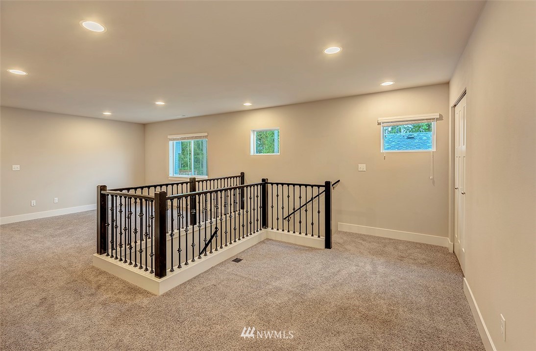 4204 223rd Place Southeast Bothell, WA 98021 - Photo 12 of 23 a view of staircase with window