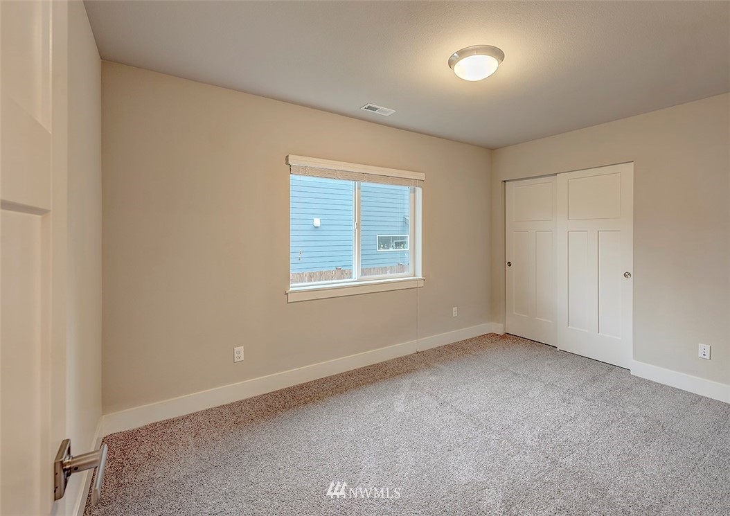 4204 223rd Place Southeast Bothell, WA 98021 - Photo 17 of 23 a view of an empty room with a window