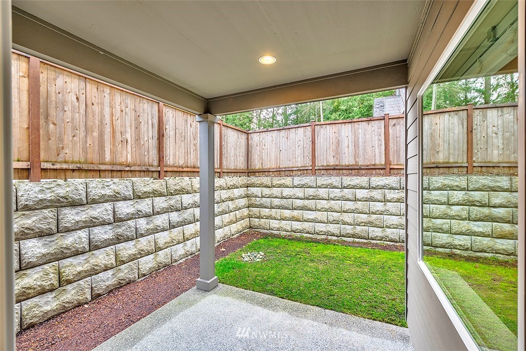 4204 223rd Place Southeast Bothell, WA 98021 - Photo 22 of 23 a view of a backyard with a garden and plants