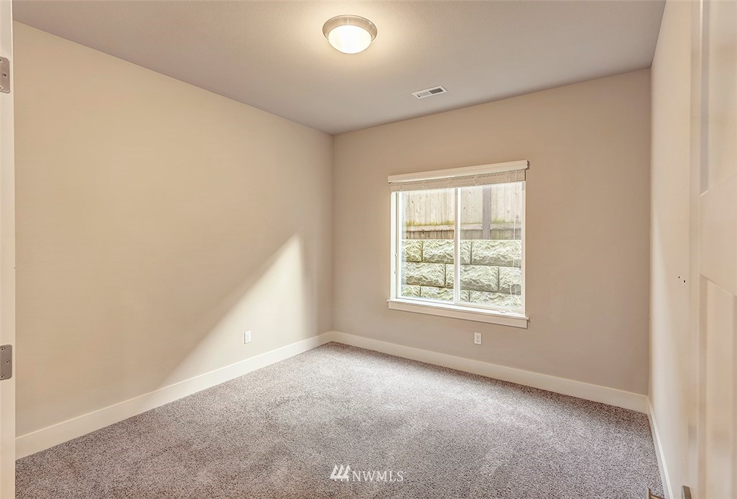 4204 223rd Place Southeast Bothell, WA 98021 - Photo 10 of 23 an empty room with a window