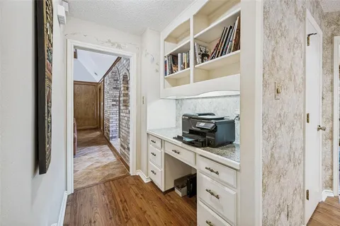 a kitchen with a sink and a stove top oven