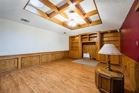 a bedroom with a bed and a walk in closet