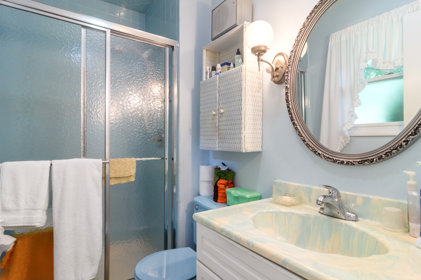 2150 Shermer Road Northbrook, IL 60062 - Photo 13 of 24 a bathroom with a sink and a mirror