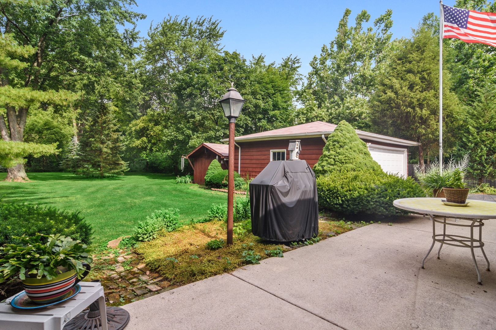 2150 Shermer Road Northbrook, IL 60062 - Photo 18 of 24 a front view of a house with garden