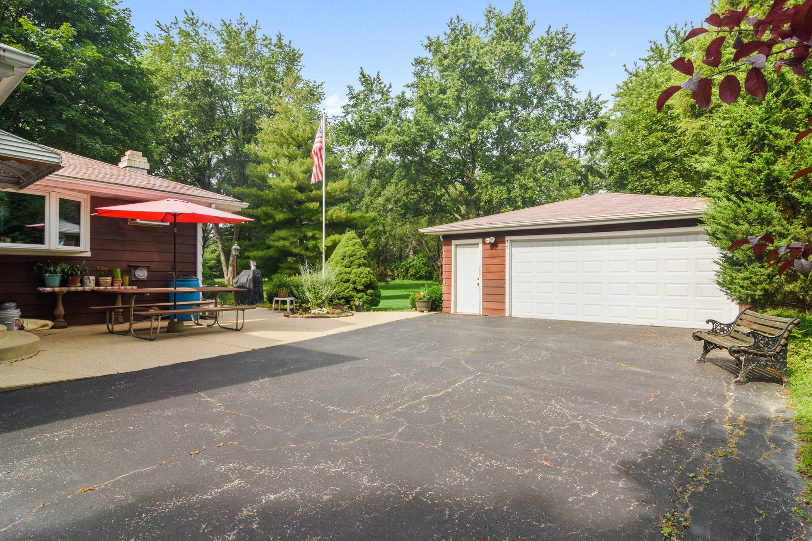 2150 Shermer Road Northbrook, IL 60062 - Photo 19 of 24 a front view of a house with yard and trees
