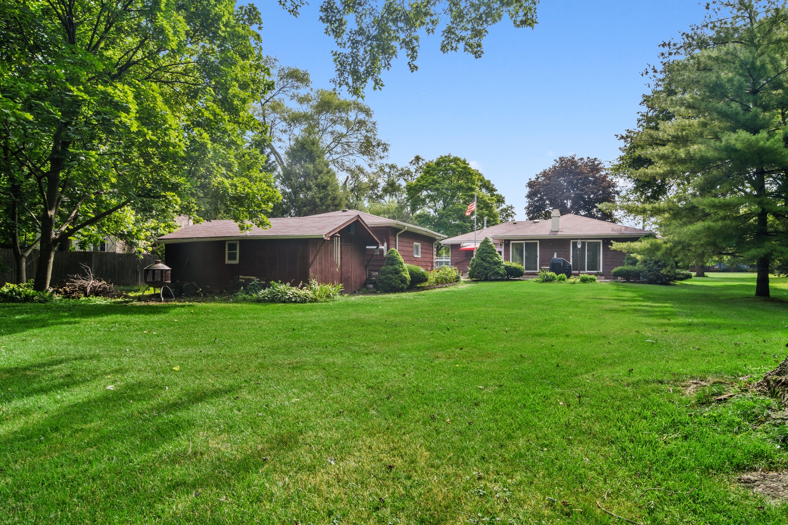 2150 Shermer Road Northbrook, IL 60062 - Photo 22 of 24 a front view of house with yard and green space