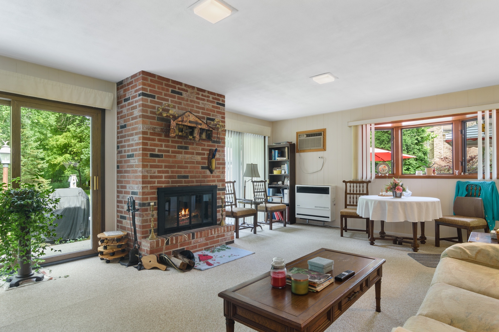 2150 Shermer Road Northbrook, IL 60062 - Photo 6 of 24 a living room with furniture and a fireplace