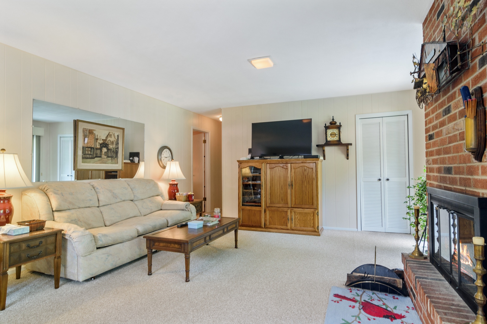 2150 Shermer Road Northbrook, IL 60062 - Photo 7 of 24 a living room with furniture and a flat screen tv