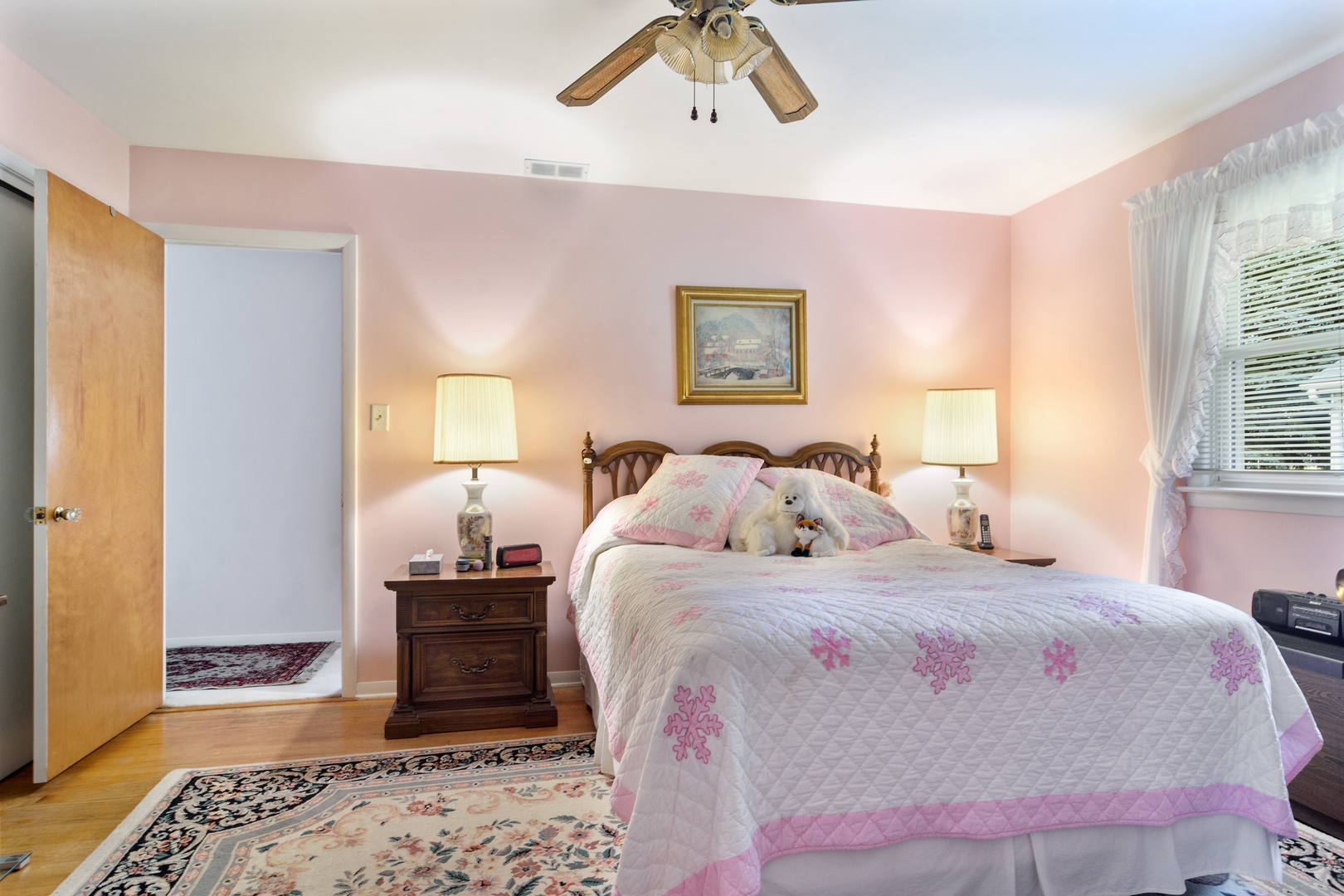2150 Shermer Road Northbrook, IL 60062 - Photo 8 of 24 a bedroom with bed and wooden floor