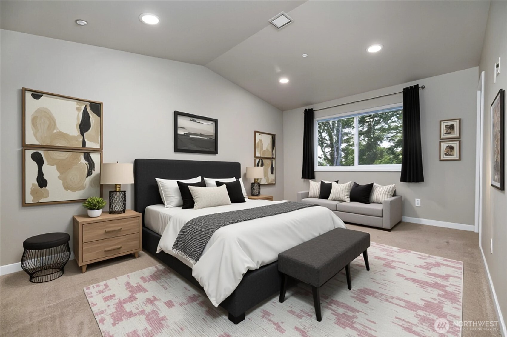 13724 Ash Way, Unit C1 Everett, WA 98204 - Photo 21 of 36 a spacious bedroom with a bed a couch and a window