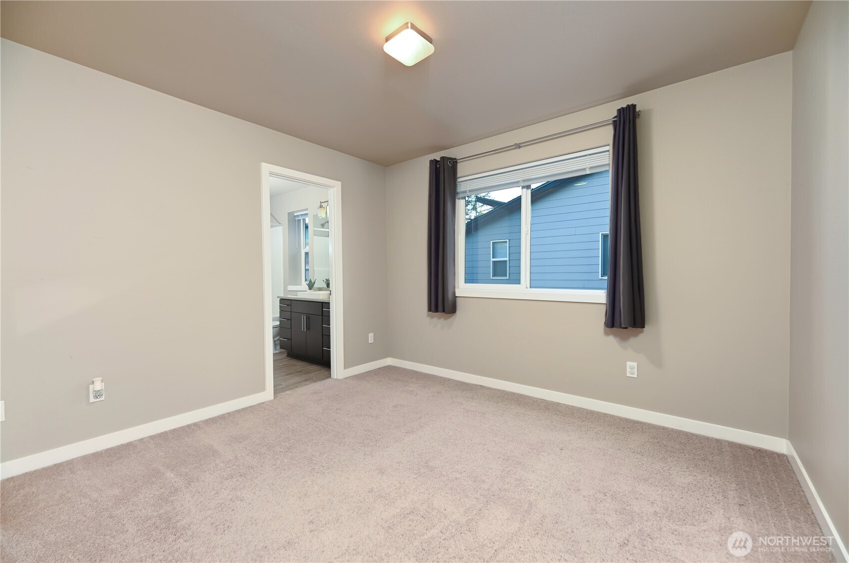 13724 Ash Way, Unit C1 Everett, WA 98204 - Photo 26 of 36 an empty room with windows