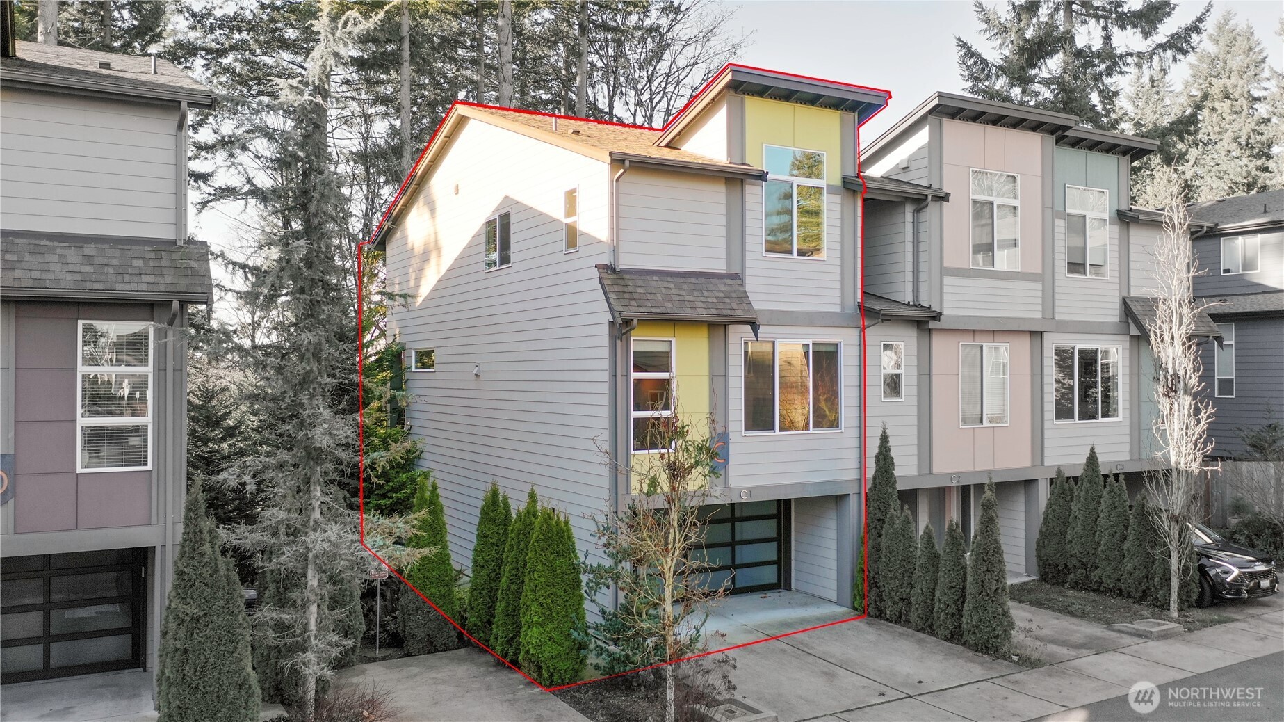 13724 Ash Way, Unit C1 Everett, WA 98204 - Photo 3 of 36 a view of a brick house with many windows