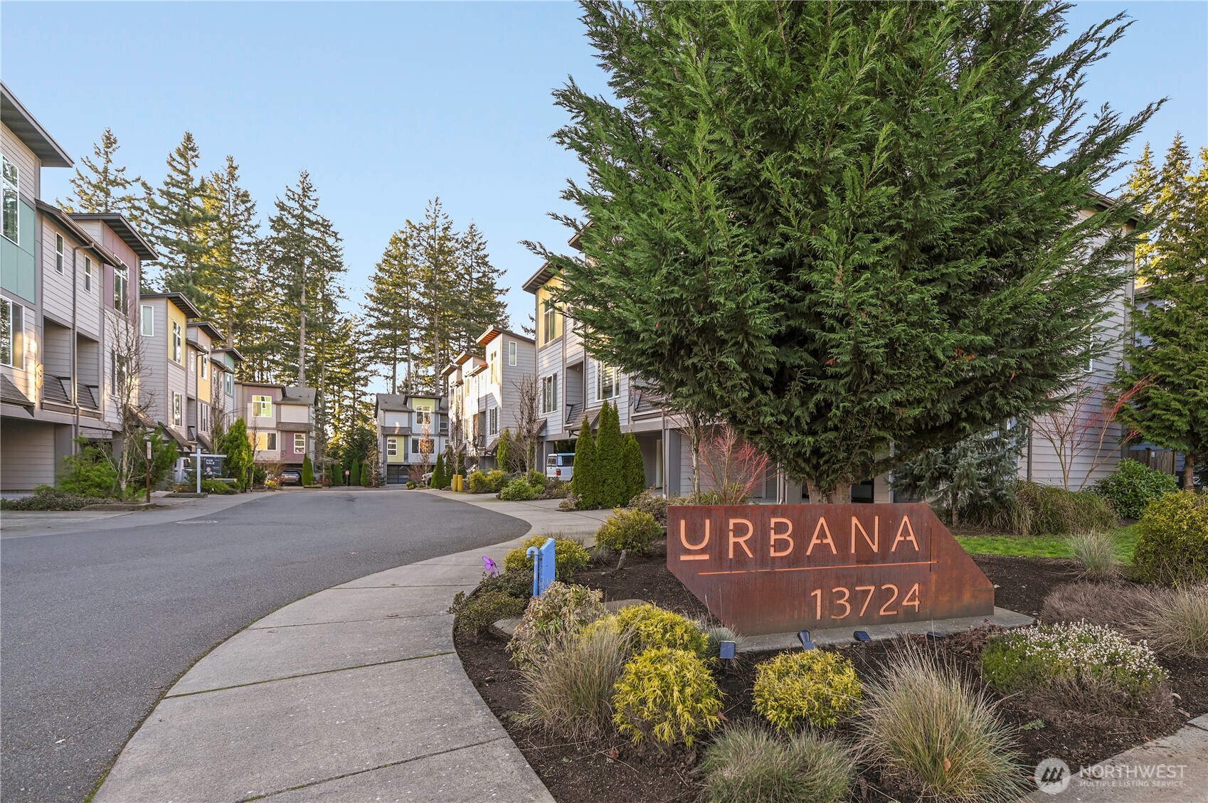 13724 Ash Way, Unit C1 Everett, WA 98204 - Photo 4 of 36 a sign board with buildings in the background