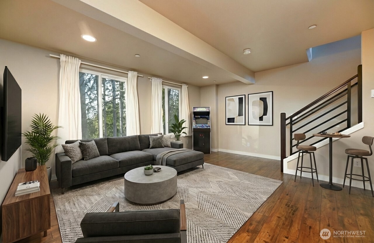 13724 Ash Way, Unit C1 Everett, WA 98204 - Photo 6 of 36 a living room with furniture and a flat screen tv