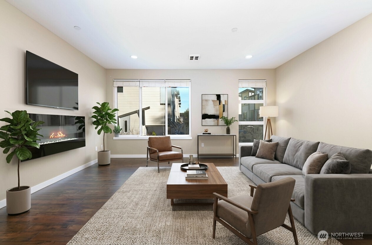 13724 Ash Way, Unit C1 Everett, WA 98204 - Photo 10 of 36 a living room with furniture and a potted plant