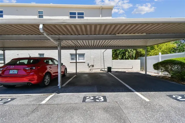 a kitchen with stainless steel appliances a stove a sink and a refrigerator