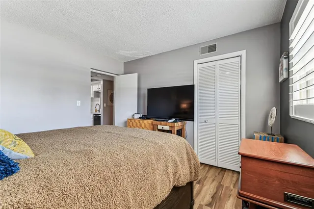 a view of a chairs and table in patio