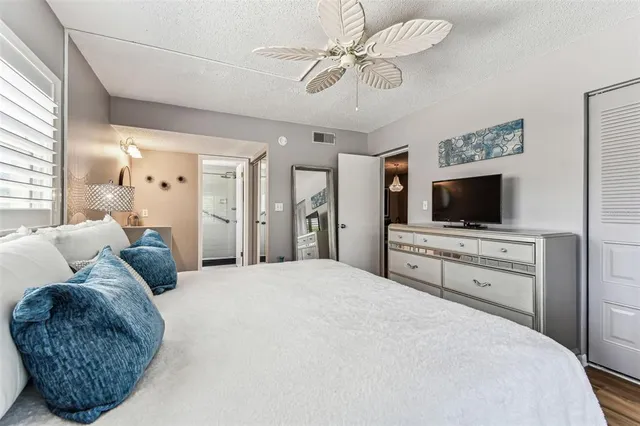 a view of a swimming pool with an outdoor seating