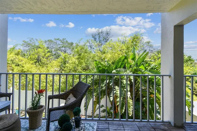 an aerial view of residential building and lake