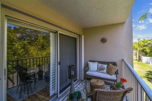 an aerial view of a house with outdoor space