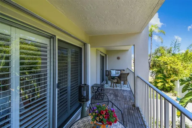 a kitchen with stainless steel appliances granite countertop a stove microwave and sink