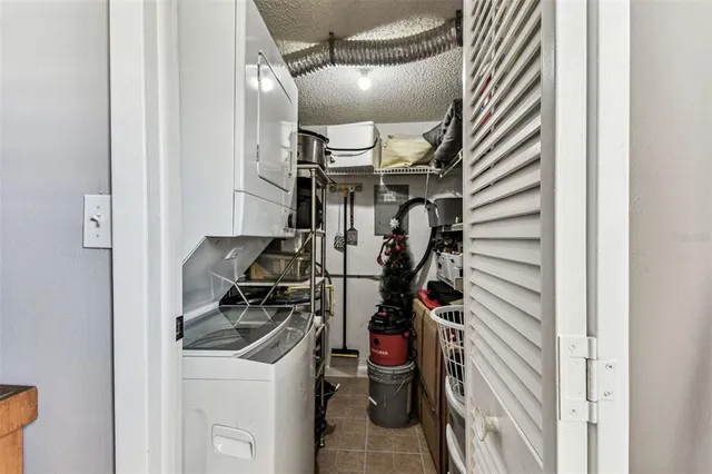 a dining room with furniture wooden floor and a rug