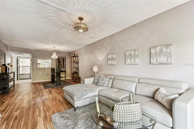 a view of a livingroom with furniture and window