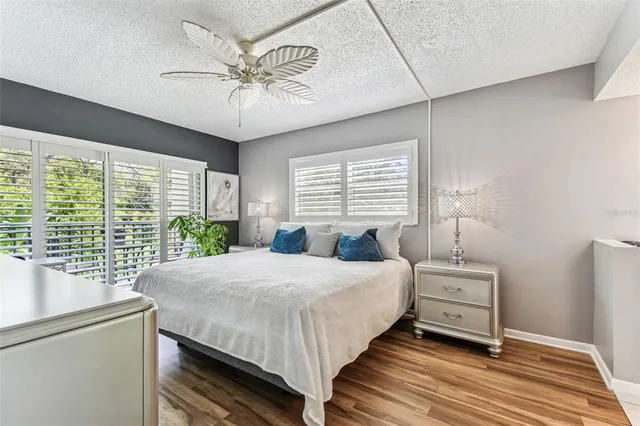 a bathroom with a double vanity sink mirror and shower