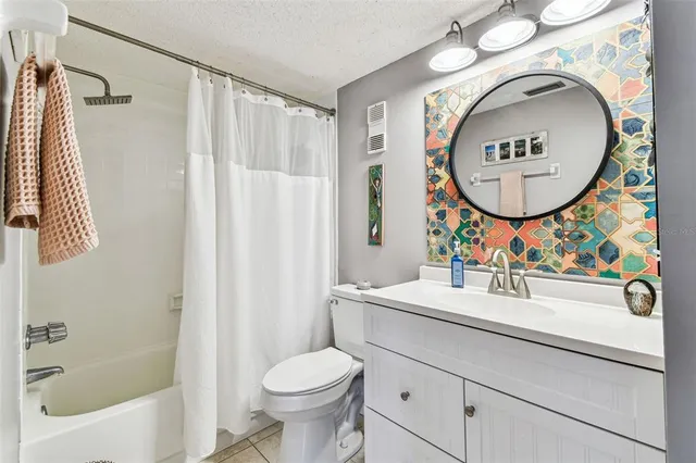 a view of swimming pool with an outdoor seating