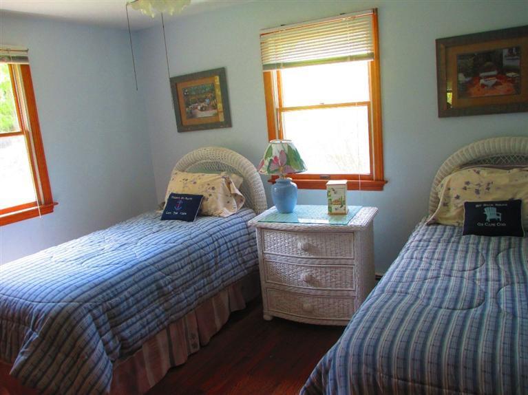 52 Thread Needle Lane Centerville, MA 02632 - Photo 15 of 32 a bedroom with a bed and a window
