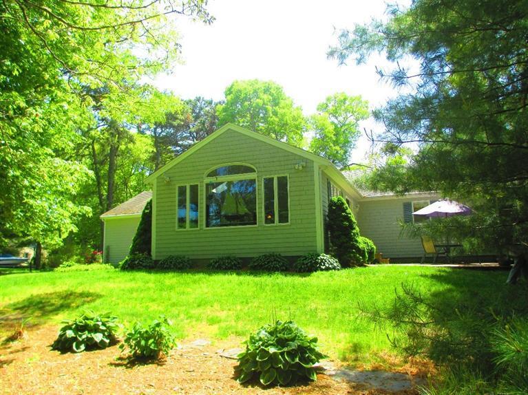 52 Thread Needle Lane Centerville, MA 02632 - Photo 24 of 32 a view of a back yard of the house