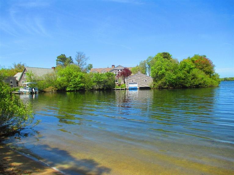 52 Thread Needle Lane Centerville, MA 02632 - Photo 31 of 32 a view of a lake with houses