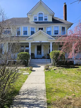 a front view of a house with swimming pool