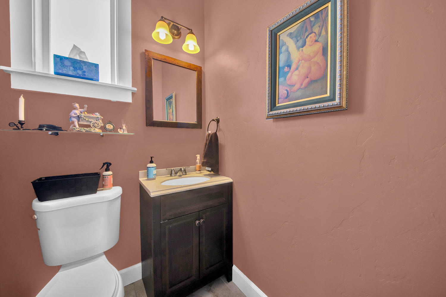 19112 Pumice Butte Road Bend, OR 97702 - Photo 18 of 36 a white toilet sitting next to a bathroom sink