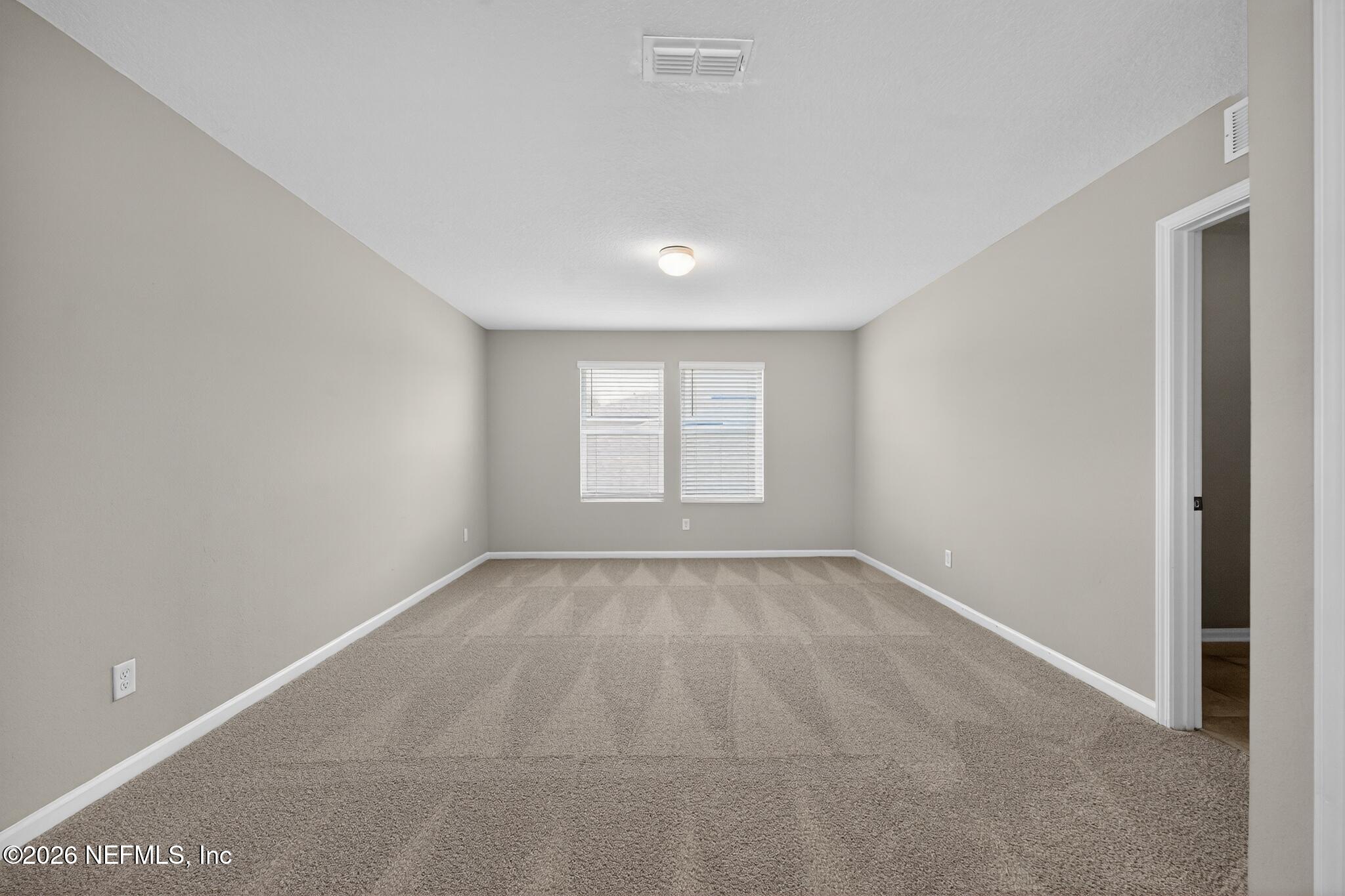 4818 Morning Rise Circle Jacksonville, FL 32218 - Photo 22 of 33 19_4818_Morning_Rise_Cir-Bedroom-8483