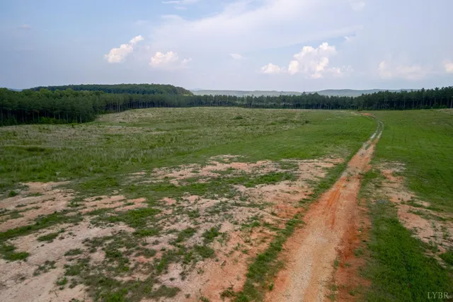 a view of a lake with a yard