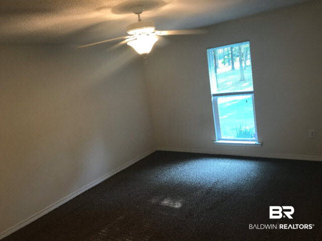 24690 Powell Lane Loxley, AL 36551 - Photo 28 of 39 Master Bedroom