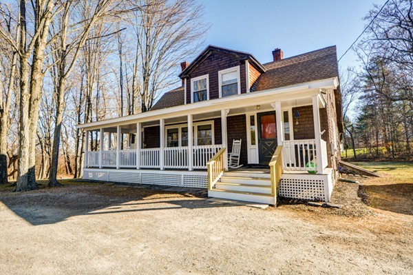 50 Lancaster Road Shirley, MA 01464 - Photo 1 of 30 a front view of a house with a yard