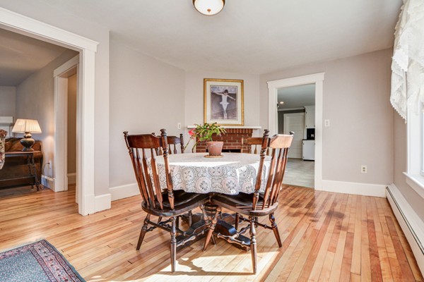 50 Lancaster Road Shirley, MA 01464 - Photo 7 of 30 a view of a dining room with furniture and wooden floor